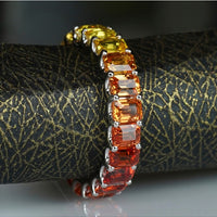 Tequila Sunrise 4 X 3 Emerald Cut Sapphire Eternity Ring