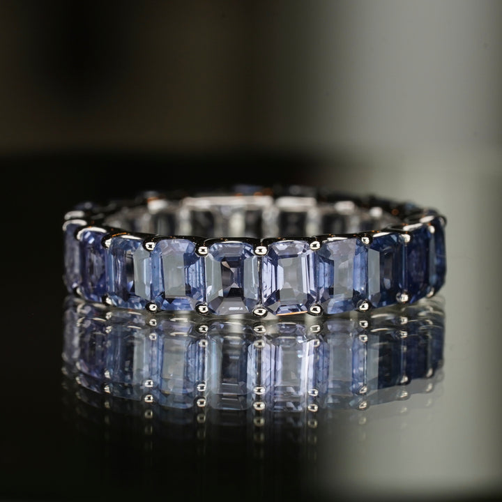 Emerald cut sapphire eternity ring.
